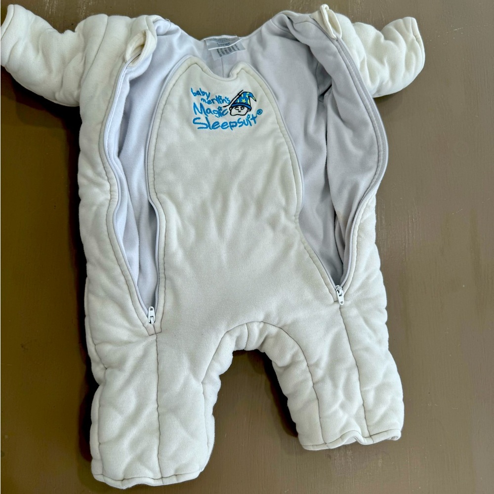 Baby Merlin’s magic sleep suit Large